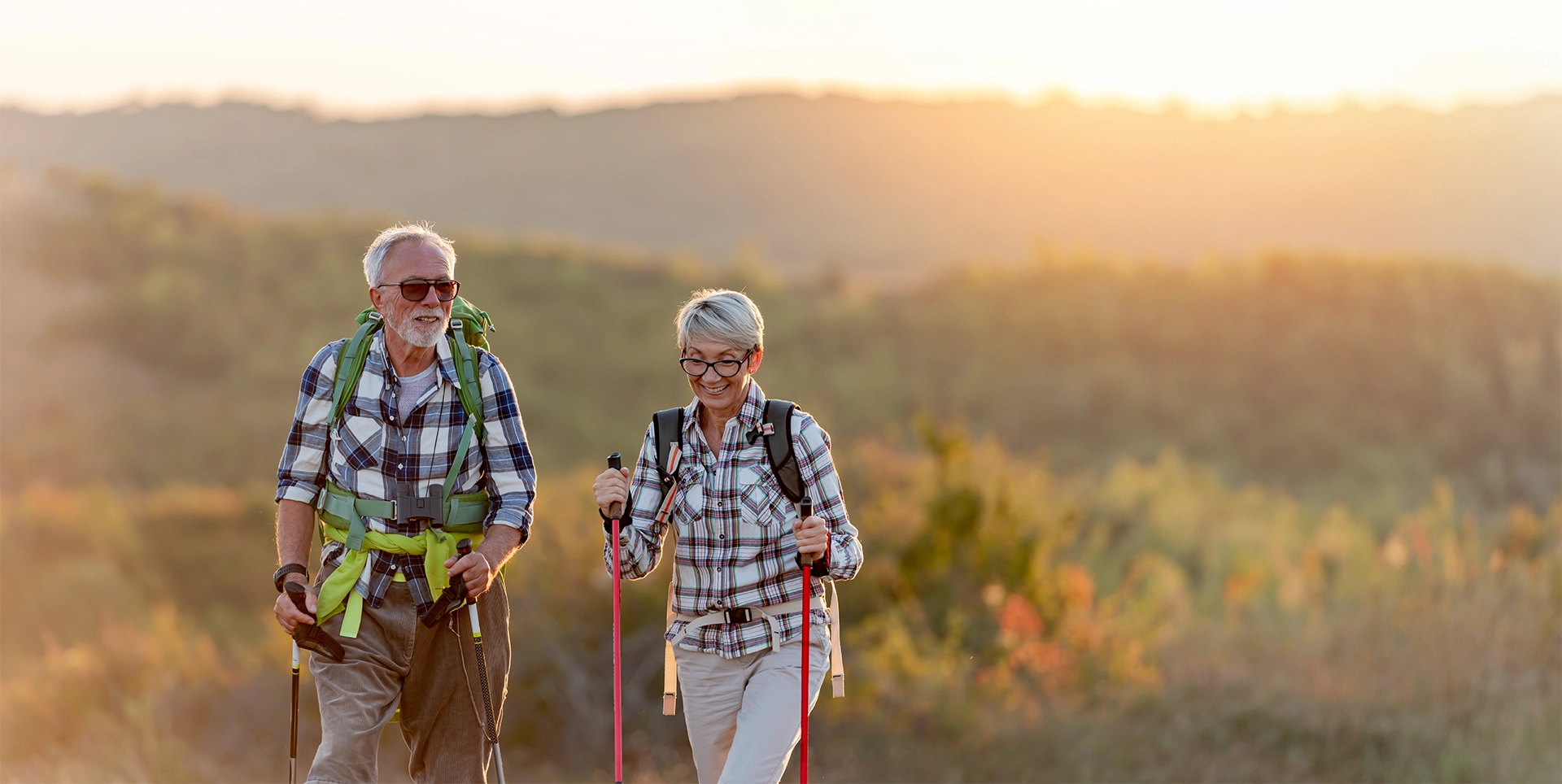 sunset-hike-senior-couple